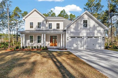 Beautiful 4 bedroom 3.5 bath home with dedicated office/den or on The Golf Club At Sanctuary Cove in Georgia - for sale on GolfHomes.com, golf home, golf lot