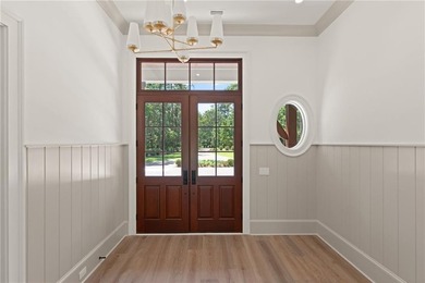 Step into a world of refined elegance with this stunning on Frederica Golf Club in Georgia - for sale on GolfHomes.com, golf home, golf lot