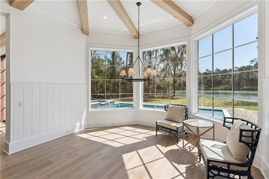 Step into a world of refined elegance with this stunning on Frederica Golf Club in Georgia - for sale on GolfHomes.com, golf home, golf lot