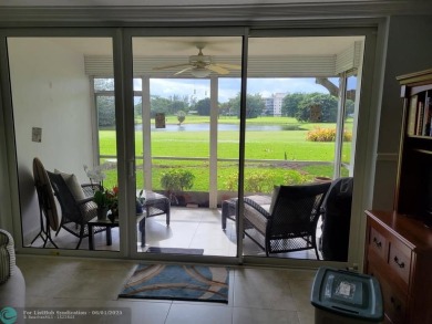 Don't miss buying this easy access ground floor unit in Palm on Palm-Aire Country Club and Resort - Palms in Florida - for sale on GolfHomes.com, golf home, golf lot