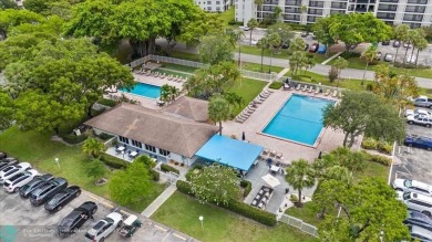 Don't miss buying this easy access ground floor unit in Palm on Palm-Aire Country Club and Resort - Palms in Florida - for sale on GolfHomes.com, golf home, golf lot