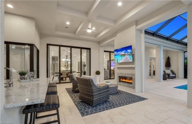 Step into unparalleled luxury in the prestigious Marsh Cove in on The Golf Club At Fiddlers Creek in Florida - for sale on GolfHomes.com, golf home, golf lot