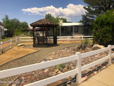 Nicely upgraded Prepper-Focused home offered in this 55+ active on Prescott Golf and Country Club in Arizona - for sale on GolfHomes.com, golf home, golf lot