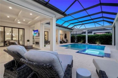 Step into unparalleled luxury in the prestigious Marsh Cove in on The Golf Club At Fiddlers Creek in Florida - for sale on GolfHomes.com, golf home, golf lot