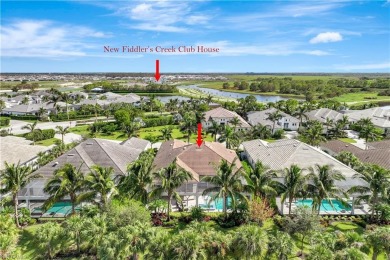 Step into unparalleled luxury in the prestigious Marsh Cove in on The Golf Club At Fiddlers Creek in Florida - for sale on GolfHomes.com, golf home, golf lot