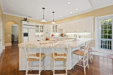 Welcome to 14 Cotillion Court, a beautifully designed raised on DeBordieu Country Club in South Carolina - for sale on GolfHomes.com, golf home, golf lot