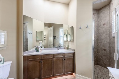 Enjoy golf & pond views from your paver lanai w/pool & spa in on The Club At Grandezza in Florida - for sale on GolfHomes.com, golf home, golf lot