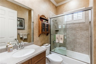 Enjoy golf & pond views from your paver lanai w/pool & spa in on The Club At Grandezza in Florida - for sale on GolfHomes.com, golf home, golf lot
