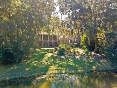 Welcome to 14 Cotillion Court, a beautifully designed raised on DeBordieu Country Club in South Carolina - for sale on GolfHomes.com, golf home, golf lot