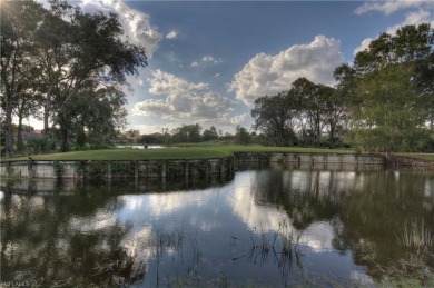 Enjoy golf & pond views from your paver lanai w/pool & spa in on The Club At Grandezza in Florida - for sale on GolfHomes.com, golf home, golf lot