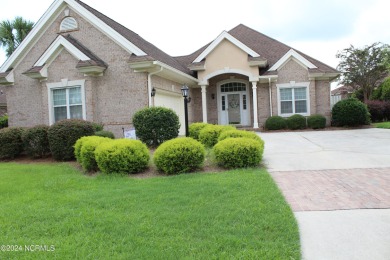 : BEAUTIFUL 3 BR, 2 BA, 2 CAR GARAGE BRICK HOME IN THE MUCH on Ocean Ridge Plantation in North Carolina - for sale on GolfHomes.com, golf home, golf lot