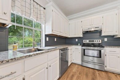 Beautifully Maintained 4-Bedroom Home sitting on two on Diamondhead Country Club in Mississippi - for sale on GolfHomes.com, golf home, golf lot