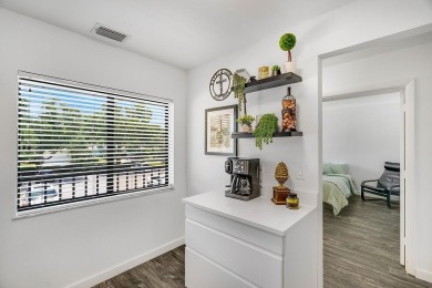 Serene Lake Views & Modern Upgrades Await! This beautifully on Pine Lakes Golf Club in Florida - for sale on GolfHomes.com, golf home, golf lot
