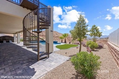 Positioned atop a scenic ridge, this impeccable home provides on Falcon Ridge Golf Course in Nevada - for sale on GolfHomes.com, golf home, golf lot