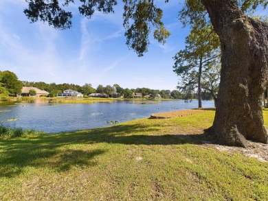 Nestled in the desirable gated community of Windward near the on Bluewater Bay Resort in Florida - for sale on GolfHomes.com, golf home, golf lot