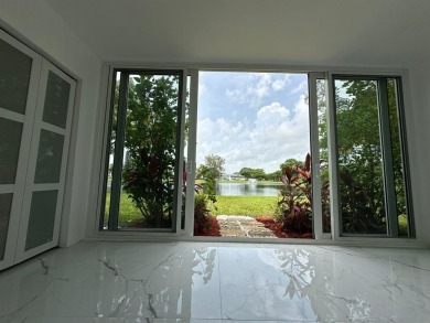 BRAND-NEW IMPACT SLIDING GLASS DOOR INSTALLED, Expanding the on Hillsboro Pines Golf in Florida - for sale on GolfHomes.com, golf home, golf lot