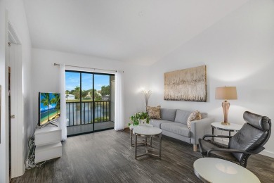 Serene Lake Views & Modern Upgrades Await! This beautifully on Pine Lakes Golf Club in Florida - for sale on GolfHomes.com, golf home, golf lot