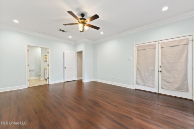 Beautifully Maintained 4-Bedroom Home sitting on two on Diamondhead Country Club in Mississippi - for sale on GolfHomes.com, golf home, golf lot