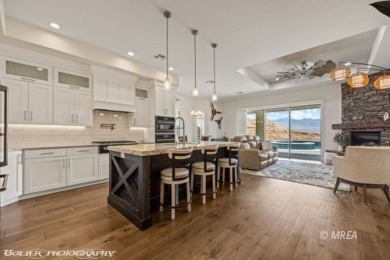 Positioned atop a scenic ridge, this impeccable home provides on Falcon Ridge Golf Course in Nevada - for sale on GolfHomes.com, golf home, golf lot