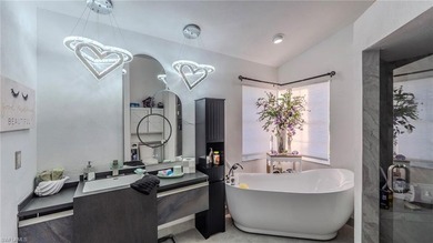 Beautiful contemporary home located on a highly desired street on Fountain Lakes Community Golf Course in Florida - for sale on GolfHomes.com, golf home, golf lot