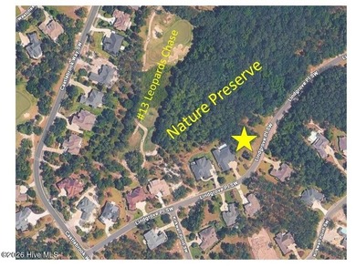 Rare Private Nature Preserve homesite with sneak peeks of #13 on Ocean Ridge Plantation in North Carolina - for sale on GolfHomes.com, golf home, golf lot