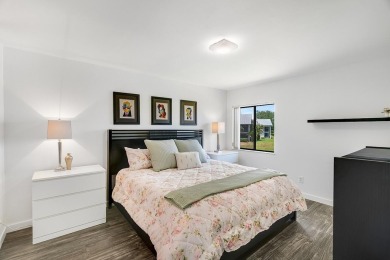 Serene Lake Views & Modern Upgrades Await! This beautifully on Pine Lakes Golf Club in Florida - for sale on GolfHomes.com, golf home, golf lot