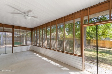 Beautifully Maintained 4-Bedroom Home sitting on two on Diamondhead Country Club in Mississippi - for sale on GolfHomes.com, golf home, golf lot