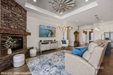 Positioned atop a scenic ridge, this impeccable home provides on Falcon Ridge Golf Course in Nevada - for sale on GolfHomes.com, golf home, golf lot