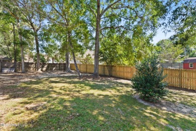 Beautifully Maintained 4-Bedroom Home sitting on two on Diamondhead Country Club in Mississippi - for sale on GolfHomes.com, golf home, golf lot
