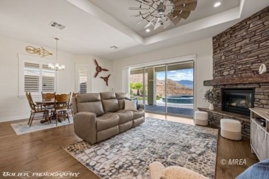 Positioned atop a scenic ridge, this impeccable home provides on Falcon Ridge Golf Course in Nevada - for sale on GolfHomes.com, golf home, golf lot