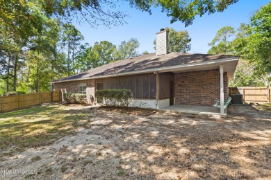 Beautifully Maintained 4-Bedroom Home sitting on two on Diamondhead Country Club in Mississippi - for sale on GolfHomes.com, golf home, golf lot