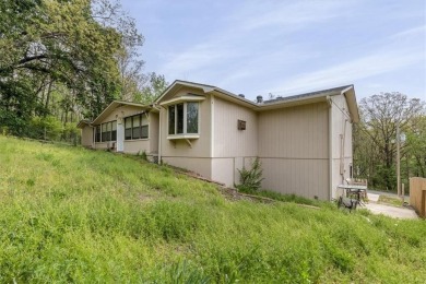 Don't miss this rare opportunity! Located near the peaceful on Bella Vista Country Club - Highlands in Arkansas - for sale on GolfHomes.com, golf home, golf lot