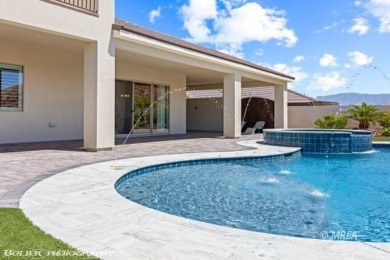 Positioned atop a scenic ridge, this impeccable home provides on Falcon Ridge Golf Course in Nevada - for sale on GolfHomes.com, golf home, golf lot