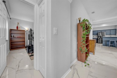 Move in ready and beautifully updated, this four bedroom three on Hernando Oaks Golf and Country Club in Florida - for sale on GolfHomes.com, golf home, golf lot