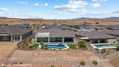 Positioned atop a scenic ridge, this impeccable home provides on Falcon Ridge Golf Course in Nevada - for sale on GolfHomes.com, golf home, golf lot