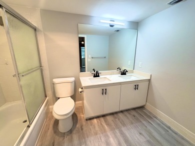 FOR SALE- Step into style and comfort with this beautifully on Wynmoor Golf Course in Florida - for sale on GolfHomes.com, golf home, golf lot