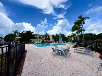 FOR SALE- Step into style and comfort with this beautifully on Wynmoor Golf Course in Florida - for sale on GolfHomes.com, golf home, golf lot