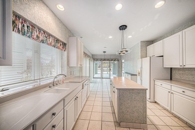 Beautiful Condo overlooking the 3rd Tee Box, Fairway and Pond in on Stonebridge Golf Club in Michigan - for sale on GolfHomes.com, golf home, golf lot