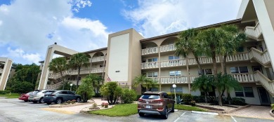 FOR SALE- Step into style and comfort with this beautifully on Wynmoor Golf Course in Florida - for sale on GolfHomes.com, golf home, golf lot