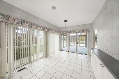 Beautiful Condo overlooking the 3rd Tee Box, Fairway and Pond in on Stonebridge Golf Club in Michigan - for sale on GolfHomes.com, golf home, golf lot