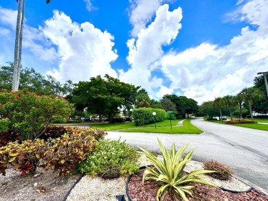 FOR SALE- Step into style and comfort with this beautifully on Wynmoor Golf Course in Florida - for sale on GolfHomes.com, golf home, golf lot