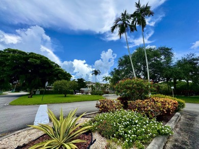 FOR SALE- Step into style and comfort with this beautifully on Wynmoor Golf Course in Florida - for sale on GolfHomes.com, golf home, golf lot