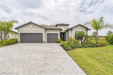 Discover refined living in this impeccably crafted home in the on Valencia Golf and Country Club in Florida - for sale on GolfHomes.com, golf home, golf lot
