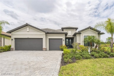 Discover refined living in this impeccably crafted home in the on Valencia Golf and Country Club in Florida - for sale on GolfHomes.com, golf home, golf lot