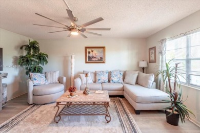Discover a vibrant lifestyle in the 55+ community of Century on Hillsboro Pines Golf in Florida - for sale on GolfHomes.com, golf home, golf lot