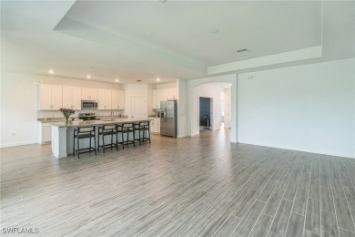Discover refined living in this impeccably crafted home in the on Valencia Golf and Country Club in Florida - for sale on GolfHomes.com, golf home, golf lot
