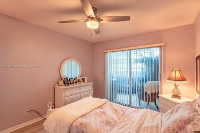 Discover a vibrant lifestyle in the 55+ community of Century on Hillsboro Pines Golf in Florida - for sale on GolfHomes.com, golf home, golf lot