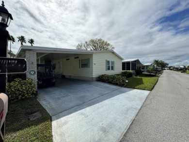 Location, Location, Location! This generously sized home is on Lake Henry Golf Club in Florida - for sale on GolfHomes.com, golf home, golf lot