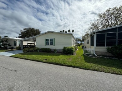 Location, Location, Location! This generously sized home is on Lake Henry Golf Club in Florida - for sale on GolfHomes.com, golf home, golf lot