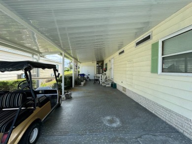 Location, Location, Location! This generously sized home is on Lake Henry Golf Club in Florida - for sale on GolfHomes.com, golf home, golf lot